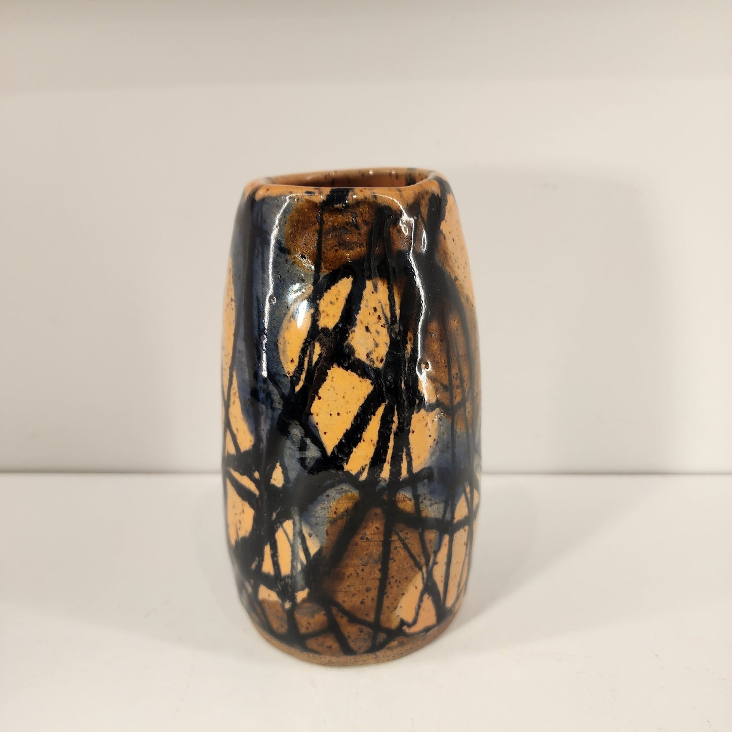 6" x 3.5" Salmon, Brown, and Dark Blue Swirlware Vase