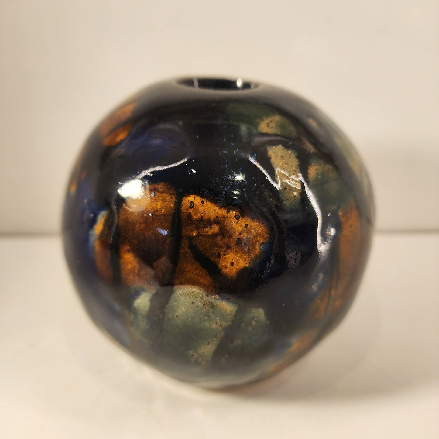 4.5" x 4" Round Dark Brown, Green and Blue Swirlware Vase